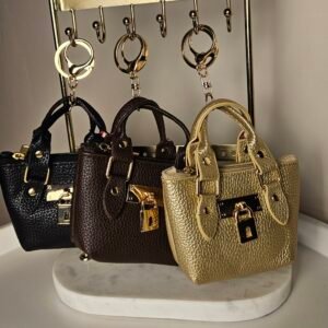 A-D-1025-1 MINI SAC PORTE CLE BABY'S CHOUX